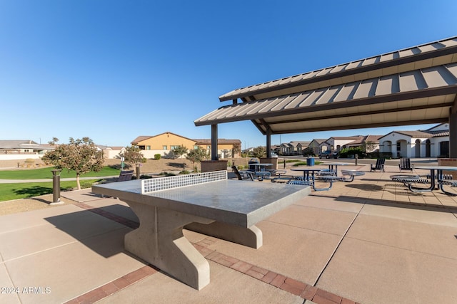 view of property's community featuring a gazebo and a patio