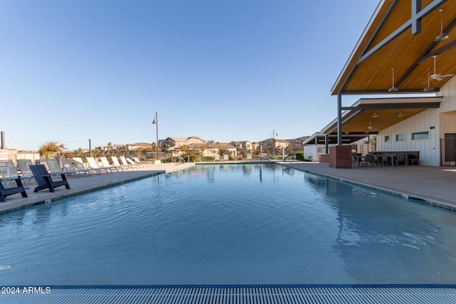 view of swimming pool with a patio