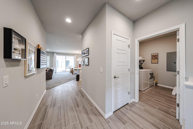 hall featuring independent washer and dryer