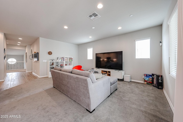 living room with light colored carpet