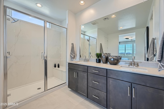 10136 E Ursula Ave, Mesa, AZ 85212 - bathroom with double vanity, a marble finish shower, recessed lighting, and tile patterned flooring
