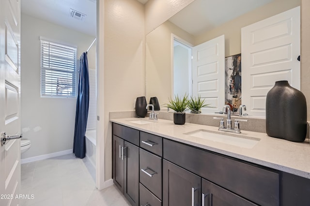 10136 E Ursula Ave, Mesa, AZ 85212 - full bathroom with double vanity, shower / bath combo, and tile patterned floors