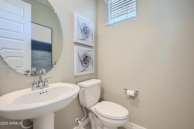 10136 E Ursula Ave, Mesa, AZ 85212 - bathroom featuring baseboards and toilet