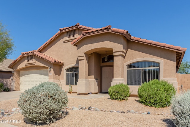 view of front of property featuring a garage