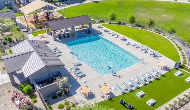 pool featuring a patio and fence