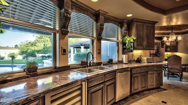 kitchen featuring wine cooler, plenty of natural light, sink, and stainless steel dishwasher