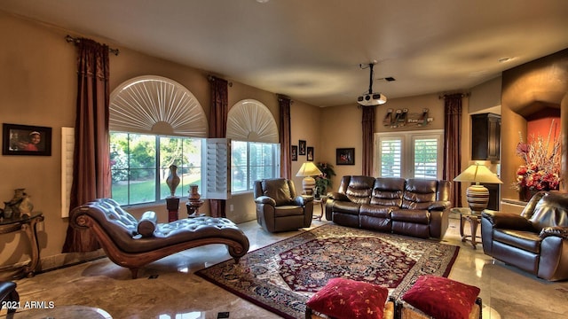 living room with plenty of natural light