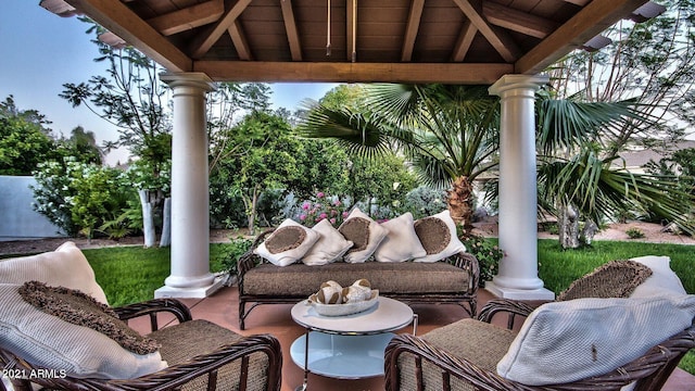 view of patio featuring a gazebo and an outdoor hangout area