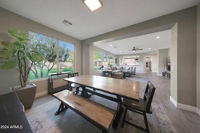 dining room featuring ceiling fan and hardwood / wood-style flooring