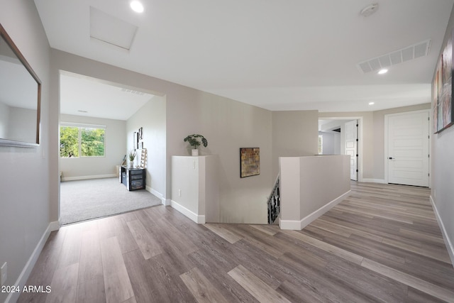 bedroom featuring access to outside, light wood-type flooring, coffered ceiling, and ceiling fan