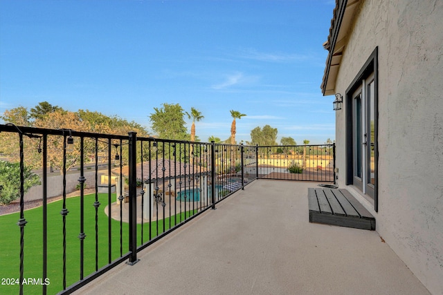 balcony featuring a patio area