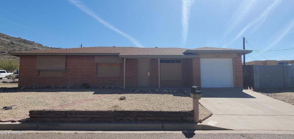 ranch-style house with a garage