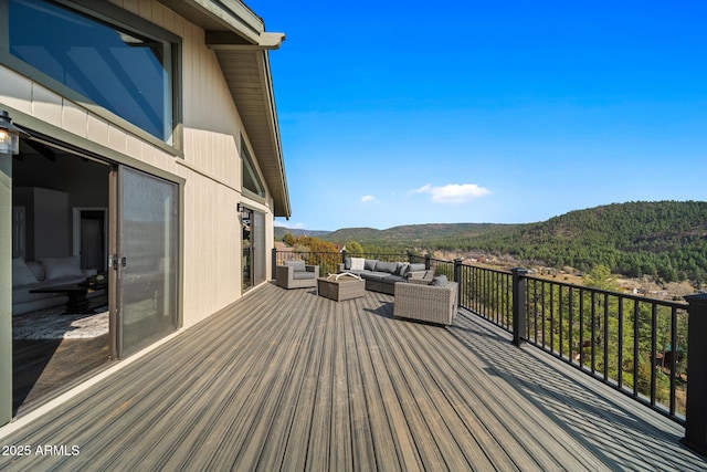 9661 W Coyote Dr, Strawberry, AZ 85544 - wooden terrace featuring a mountain view and an outdoor living space