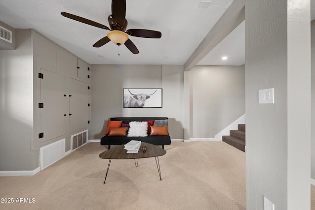 9661 W Coyote Dr, Strawberry, AZ 85544 - sitting room featuring visible vents, carpet, baseboards, stairway, and a ceiling fan