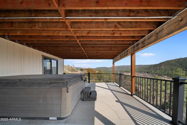 9661 W Coyote Dr, Strawberry, AZ 85544 - view of patio / terrace featuring a mountain view and a hot tub