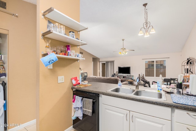 kitchen with black dishwasher, sink, ceiling fan with notable chandelier, hanging light fixtures, and white cabinetry