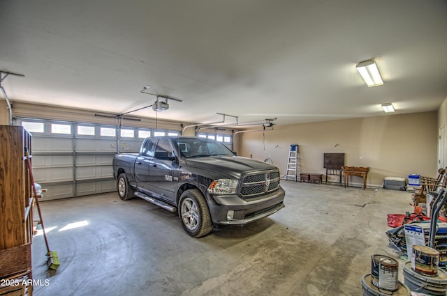 garage featuring a garage door opener