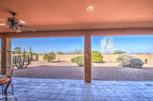 view of patio / terrace featuring ceiling fan