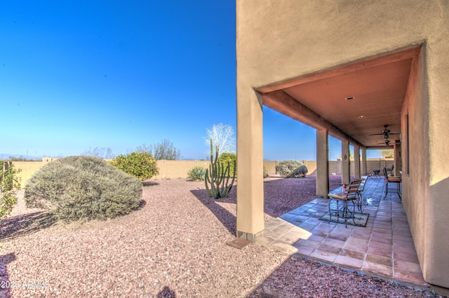 view of patio with ceiling fan