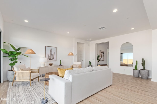 living room with light hardwood / wood-style flooring