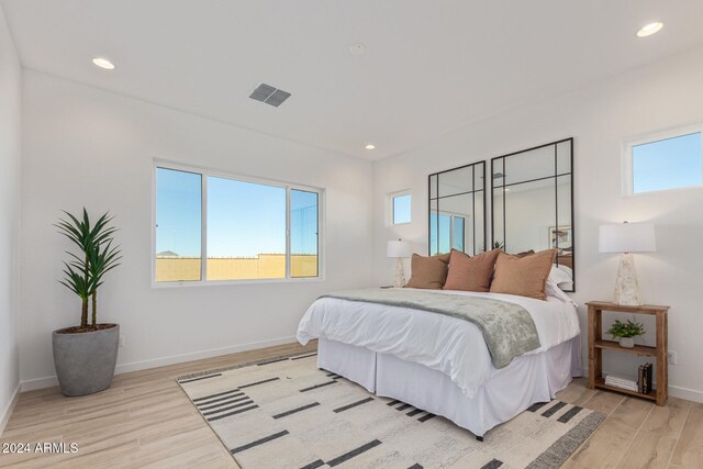 bedroom featuring light hardwood / wood-style flooring