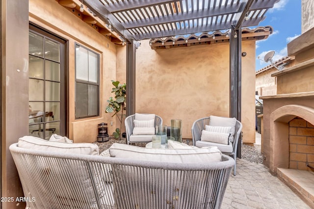 view of patio with outdoor lounge area and a pergola