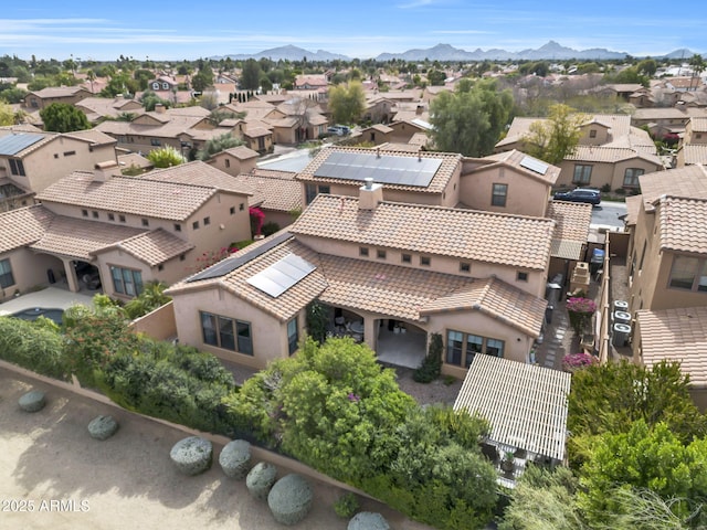 aerial view featuring a residential view and a mountain view