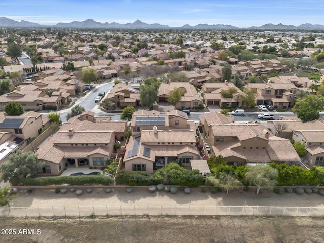 bird's eye view with a residential view and a mountain view