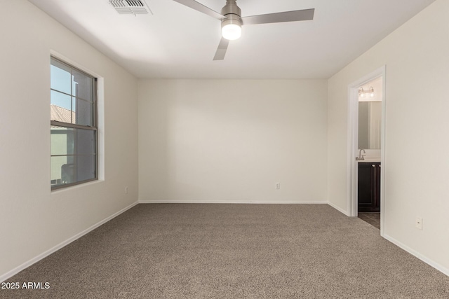 1255 S Rialto Unit 115, Mesa, AZ 85209 - unfurnished room with carpet floors and ceiling fan