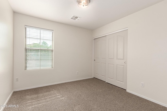 1255 S Rialto Unit 115, Mesa, AZ 85209 - unfurnished bedroom with carpet floors and a closet