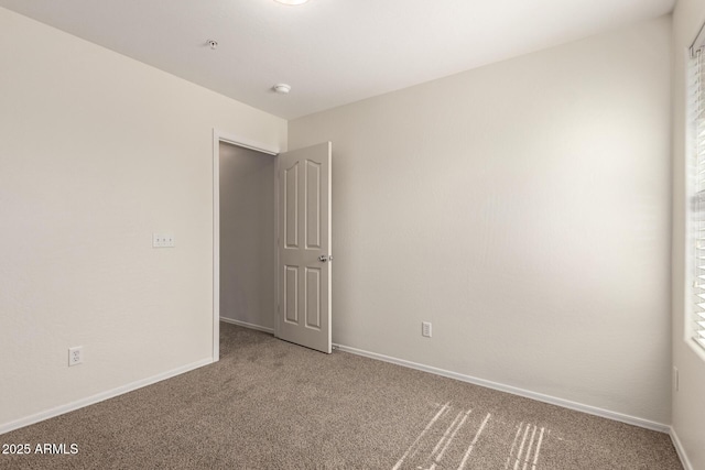 1255 S Rialto Unit 115, Mesa, AZ 85209 - carpeted empty room with fire sprinkler in ceiling and a smoke detector