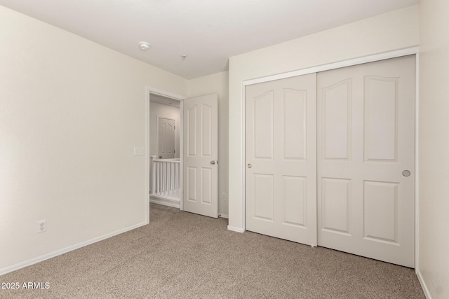 1255 S Rialto Unit 115, Mesa, AZ 85209 - unfurnished bedroom featuring carpet floors and a closet