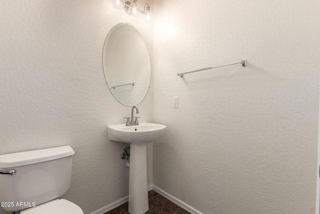 1255 S Rialto Unit 115, Mesa, AZ 85209 - half bathroom with toilet and baseboards