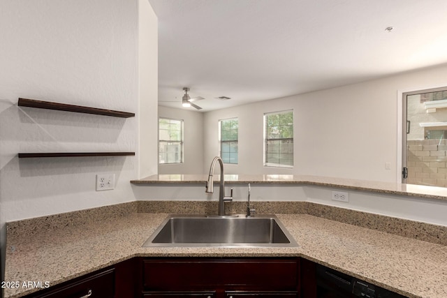 1255 S Rialto Unit 115, Mesa, AZ 85209 - kitchen with ceiling fan, light stone countertops, and dishwasher