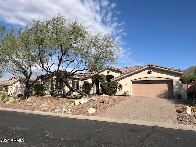 view of front of home with a garage