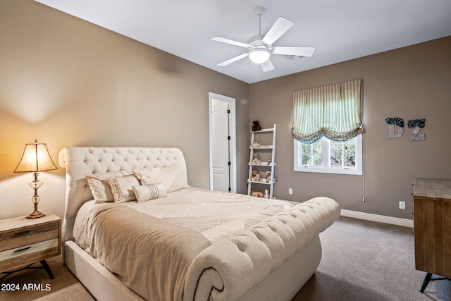 bedroom with carpet flooring, baseboards, and ceiling fan
