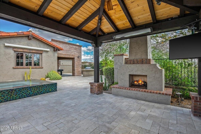 37440 N 104th Pl, Scottsdale, AZ 85262 - view of patio featuring an outdoor brick fireplace and a gazebo
