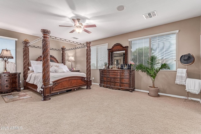 19427 W Colter St, Litchfield Park, AZ 85340 - carpeted bedroom featuring baseboards and a ceiling fan