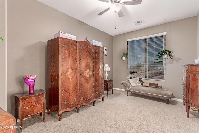19427 W Colter St, Litchfield Park, AZ 85340 - living area featuring carpet, a ceiling fan, and baseboards