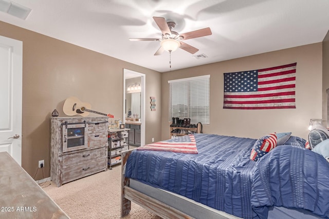 19427 W Colter St, Litchfield Park, AZ 85340 - bedroom featuring carpet floors, ensuite bath, and a ceiling fan
