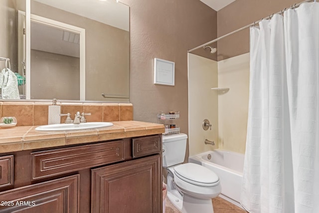 19427 W Colter St, Litchfield Park, AZ 85340 - full bathroom with toilet, backsplash, vanity, shower / bath combination with curtain, and tile patterned floors