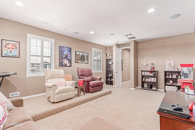 19427 W Colter St, Litchfield Park, AZ 85340 - carpeted living room with baseboards, recessed lighting, and plenty of natural light