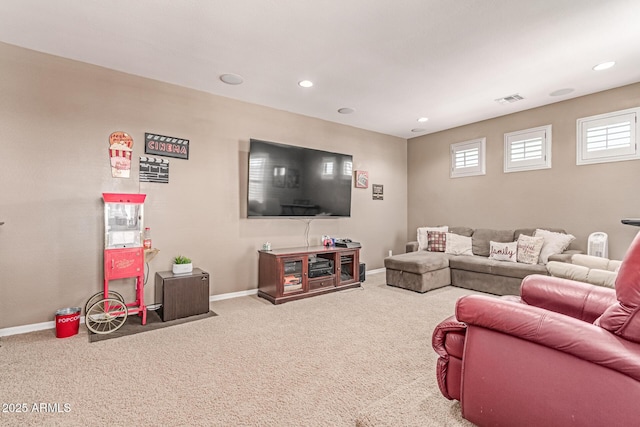 19427 W Colter St, Litchfield Park, AZ 85340 - carpeted living room featuring baseboards and recessed lighting