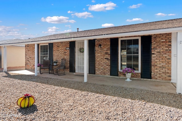 back of house featuring a patio