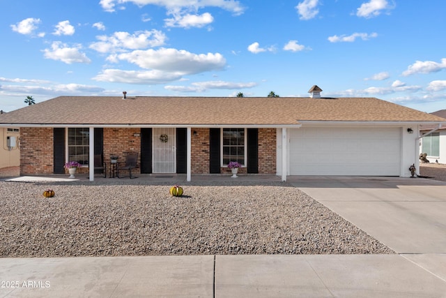 single story home featuring a garage