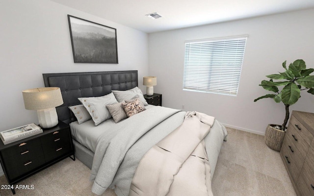 bedroom featuring visible vents, light carpet, and baseboards