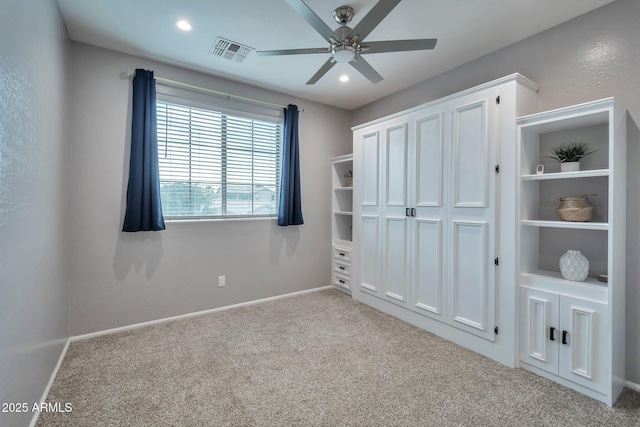 2210 W Goldmine Mountain Dr, Queen Creek, AZ 85144 - unfurnished bedroom with visible vents, baseboards, recessed lighting, and carpet