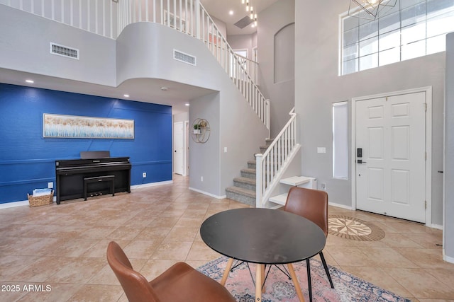 2210 W Goldmine Mountain Dr, Queen Creek, AZ 85144 - foyer with stairs, visible vents, and baseboards