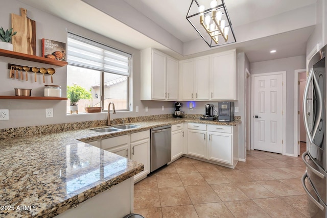 2210 W Goldmine Mountain Dr, Queen Creek, AZ 85144 - kitchen featuring a sink, white cabinets, appliances with stainless steel finishes, and light tile patterned flooring