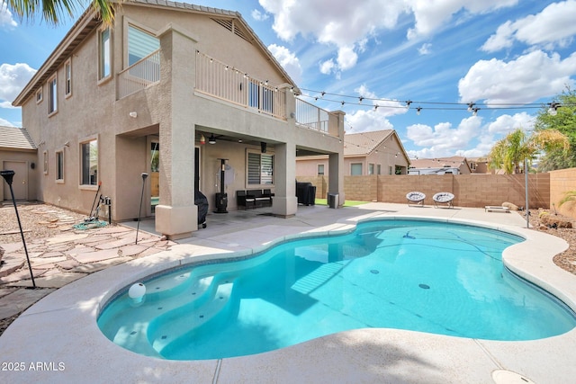2210 W Goldmine Mountain Dr, Queen Creek, AZ 85144 - view of pool with a patio, a fenced backyard, a fenced in pool, and a ceiling fan